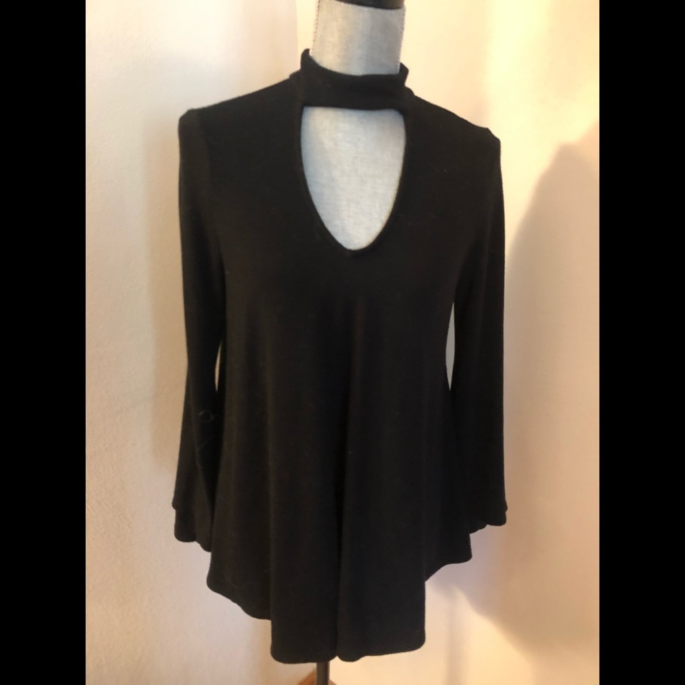 Cute sexy black swing top with open neckline